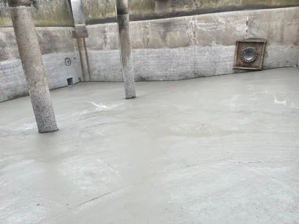 Interior of a freshly poured concrete tank chamber